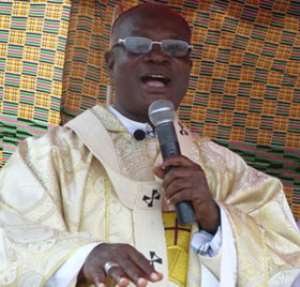 Bishop Nketsiah addressing the Catholic congregation