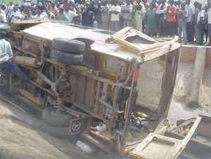 The Benz Bus lying on its side after the gory accident.