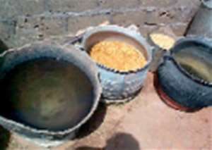 Equipment for parboiling oflocal rice in Northern Ghana.