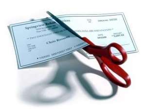 At Last, Pay Cut for Public Officers Begins