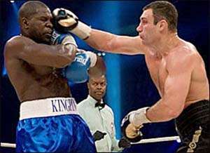 Klitschko delivers a right punch to Johnsons face