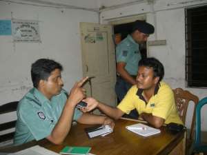 Police officer Wahid being interviewed by the author about the murder of Swopon Mondol. PhotoDipal Barua