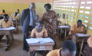 Minister Tours Exams Centres