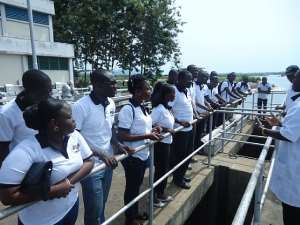 Members of Kloma Gbi being briefed by officials of Kpong Water Works at the old treatment plant.