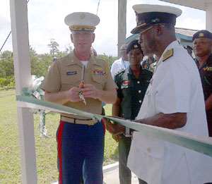 Commodore Sowa cutting ribbon with Lt Col John Van Steenburgh and Lt Keith Blakely