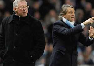 Sir Alex Ferguson - Man Utd coach and Roberto Mancini - Man City coach