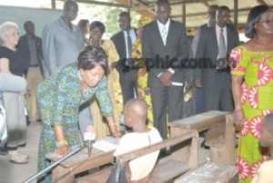 Mrs Dr Naadu Mills, First Lady and her entourage, interacting with some of the kids at the Dompoase M/A Kindergarten.