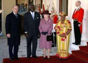 Britain's Queen Elizabeth 2nd R and the Duke of Edinburgh L meet Ghana's President John Agyekum Kufuor and his wife Theresa at Buckingham Palace in London