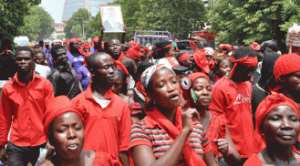 A group of mourners trooping to the Efua Sutherland Children's Park in Accra for the traditional one week celebration of the death of President J.E.A. Mills