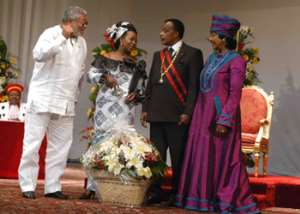 Jerry Rawlings and Winnie Mandela right in a hearty chat with the First Couple of the Republic of Congo.