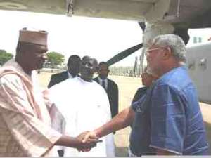 Former President Rawlings being welcomed by Hon. Ibrahim Dasuki Jalo-Waziri, president of Association of Local Governments of Nigeria.