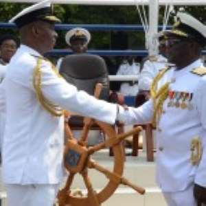 Real Admiral Geoffery Mawuli Biekro right, handing over the staff of to Commodore Peter Faidoo the new Chief Naval Staff