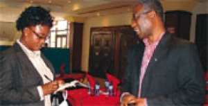 Dr Elias Sory (right) speaking to our reporter, Lucy Adoma Yeboah