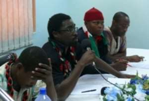 Spokesperson SaCut Amenga-Etegoholding micat the press briefing