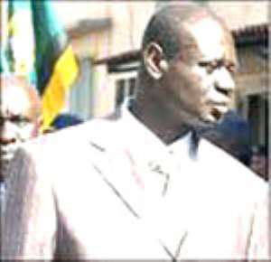 Ashanti Regional Minister Samuel Sarpong paying homage to Otumfuo