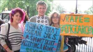 George Legg (centre) was one of many men who walked in solidarity with female friends
