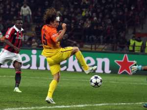 Sulley Muntari in action for Milan against Barcelona