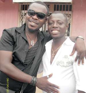 Kofi B (left) in a pose with Kwame Mickey