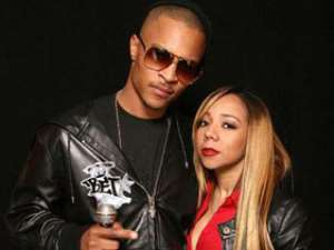 Tameka Tiny Cottle says the couple will have a fairy-tale wedding in 2010. (Photo: T.I. and girlfriend Tiny)