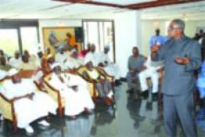 President J.E.A. Mills (standing ) addressing the Muslim leaders  at the Peduase Lodge in the Eastern Region.