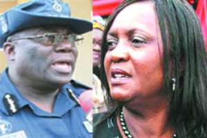 Paul Tawiah Quaye - IGP  (left),Mrs. Georgina Theodora Wood, CJ(right)