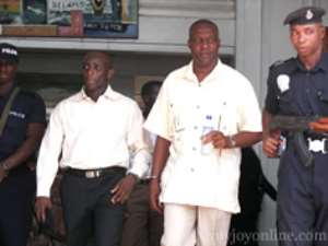 Tagor, in long-sleeves and Alhaji Issah Abass second from right