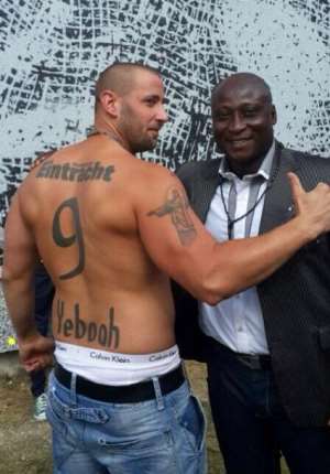 Loyal Frankfurt fan unveils massive tattoo of cult hero Tony Yeboah