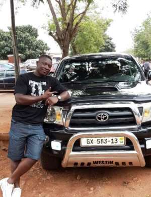 The Alleged Fraudster With The Toyota Tacoma Car