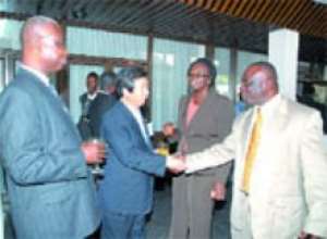 Mr Peter Asare-Bediako (right), Operations and Maintenance Manager of Bulk Oil Storage and Transportation(BOST) Company Limited, exchanging pleasantries with Mr Kang Hyun (2nd left), Chairman of the Korea Petroleum Association.