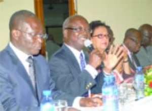 Mr Kwame Peprah (middle) Chairman of the Board of Trustees of SSNIT addressing stakeholders at the 6th SSNIT Stakeholders Forum in Accra.Those with him are Mrs Sati Ocran (right) Government Representative and Dr Frank Odoom (left) Director General-SSNIT.