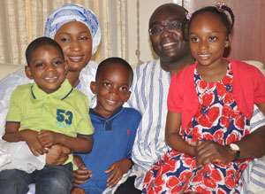 DR. BAWUMIAH WITH HIS WIFE AND CHILDREN