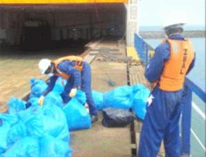 Some workers of Zeal Environment taking delivery of some plastic waste at the gantry. INSET: The liquid waste treatment plant.