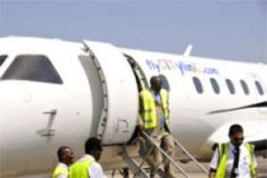 Air Commodore Kwame Manfi disembarking from the new aircraft after inspection.