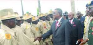 President J.E.A. Mills interacting with the war veterans after the ceremony