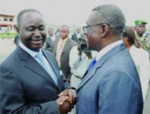 President Mills being received by President Francois Bozize of the Central African Republic on arrival at the Bangui Airport last Saturday.