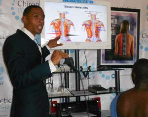 Dr. Marcus A. Manns explaining how the machine works