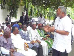 Rawlings talking to the delegation from UW
