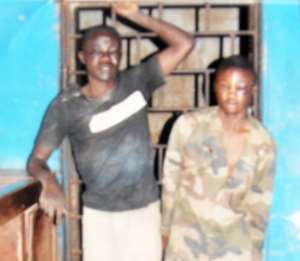 Nana Yaw Boateng (in military attire) and Paul Adutwum