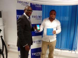 Kwaku Sekyi-Addo In Black And The CEO Of TECNO, Maxwell Takyi In White Unveiling The New Phantom Z Device