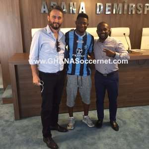 Ibrahim Moro and his agent Alex Ackumey completing the deal in Turkey.