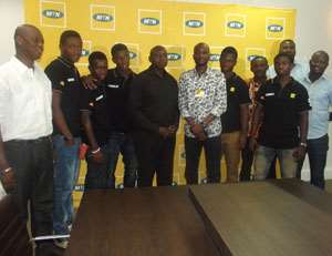 Officials of MTN, OMP and the finalist in a pose after the visit