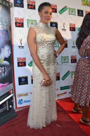 Actress Nkeiru Umeh Shimmers in Sherri Hill Gown