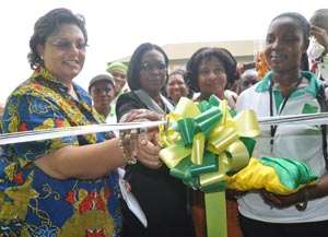 Hannah Teeth, Minister of Trade cutting the tap to open the Adenta Shopping Centre with support from Nubyl Kakra Van Lare and Rose Margaret Kpodo