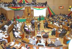 Parliament observes a minutes silence for late President Mills