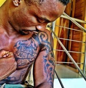 Iyanya Mourns Parents, Brother With Tattoos