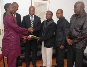 NDC AMSTERDAM HOLLAND BRANCH PRESENTS BOOK OF CONDOLENCE TO GHANA EMBASSY - THE NETHERLANDS