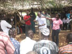 Kofi Buah addressing cocoa farmers