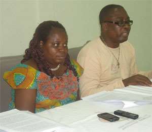 Stephen Cofie (left) addressing the media. With him is Elizabeth Esi Danquah, Interim Vice Chairperson