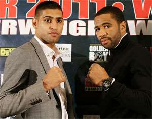 Amir Khan in a pose with Lamont Peterson (right)