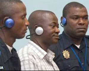 Issa Sesay (C) will spend at least 52 years in jail
